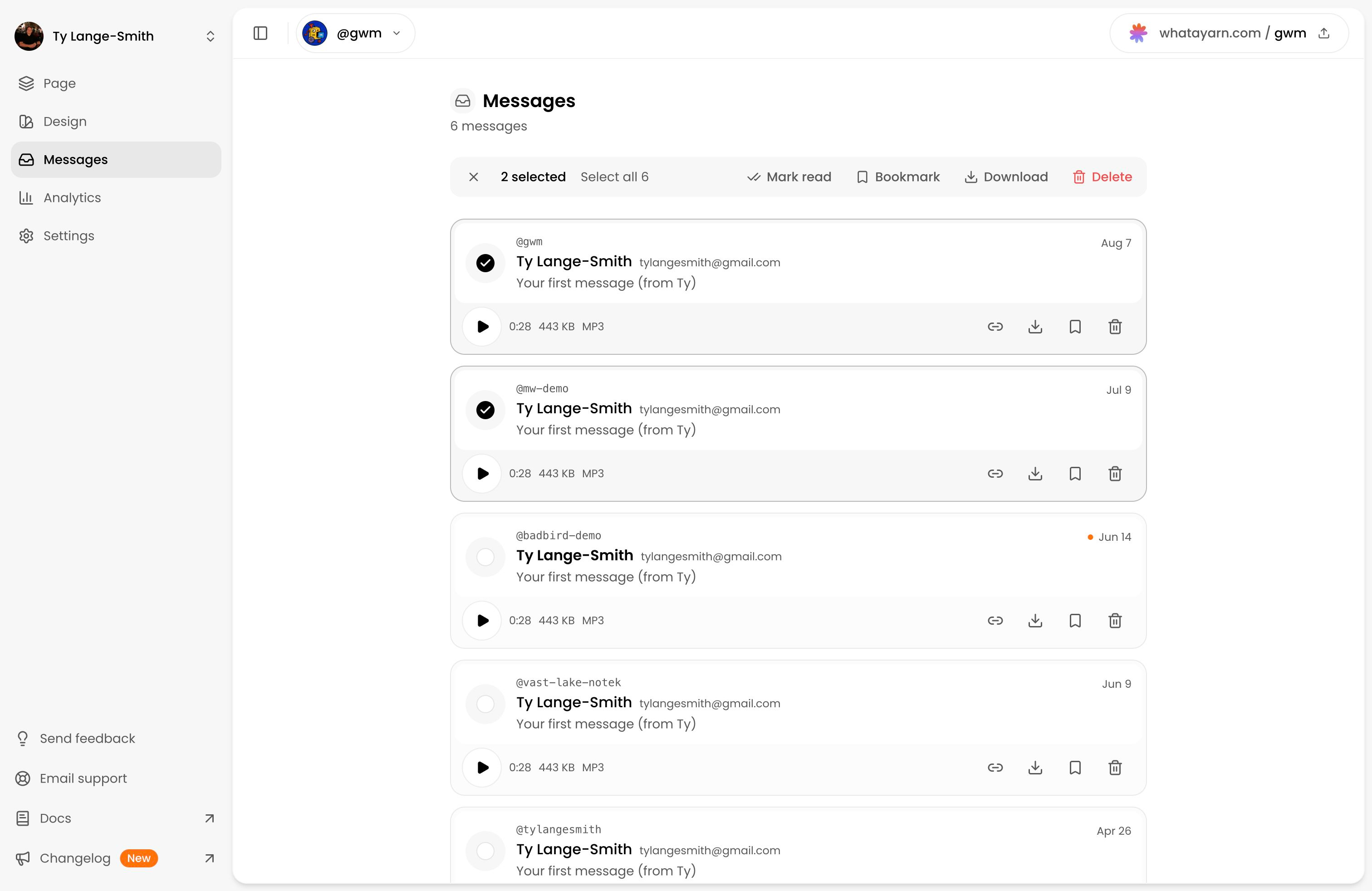 The inbox with two welcome messages selected and the bulk Download control visible in the toolbar